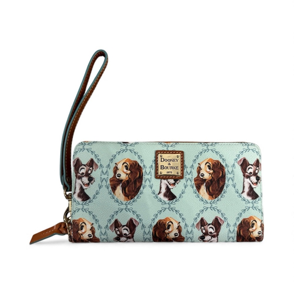 Dooney & Bourke Disney Parks Lady and the Tramp Wristlet. NWOT.